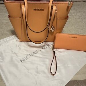 Jet Set East West Logo Charm Saffiano Leather Tote Bag